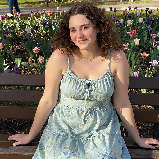 Joyful Woman in Sundress on Bench