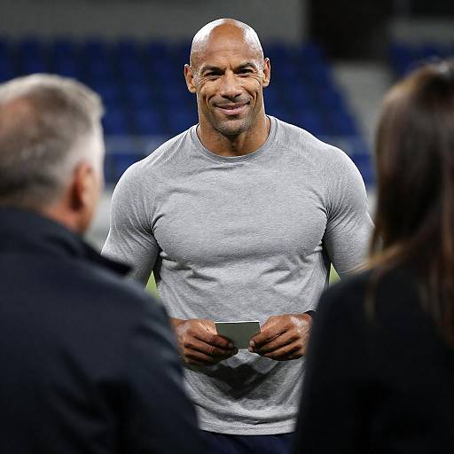 Smiling Bald Man Holding White Card