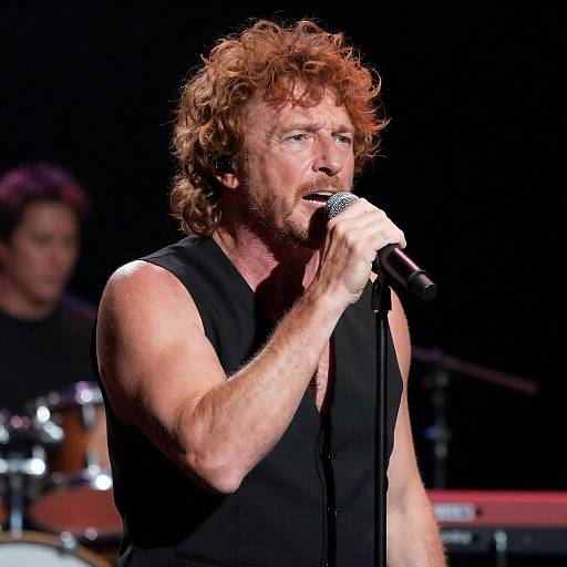 Mid-aged Male Singer Performing on Stage