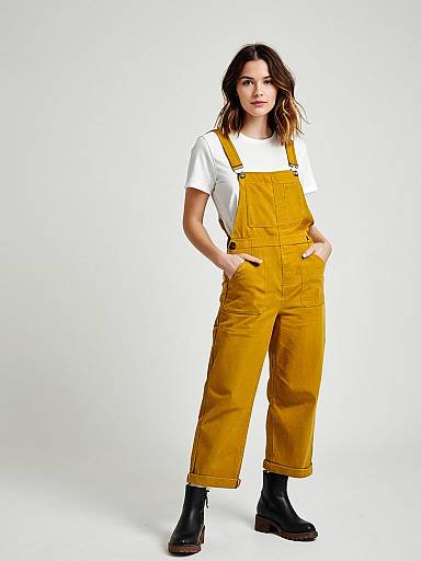 Woman in Mustard Yellow Overalls and Black Boots