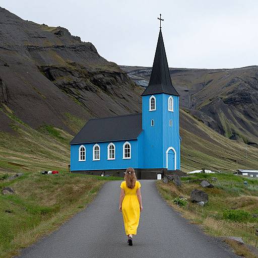 Woman Walking to Blue Church in Iceland