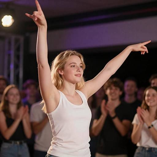Energetic Blonde Woman Dancing on Stage