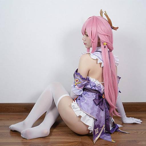 Cosplayer with Pink Hair in Purple Costume