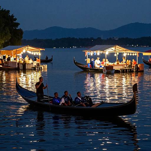 Photograph of a twilight river scene with glowing, illuminated floating restaurants and a wooden boat carrying five people in the foreground.
