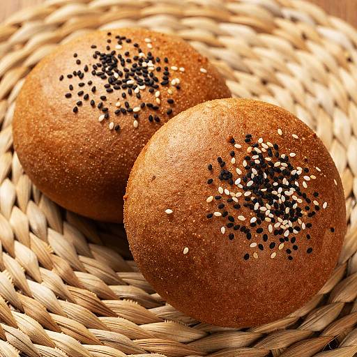 Sesame Seed Bread Rolls on Wicker Mat