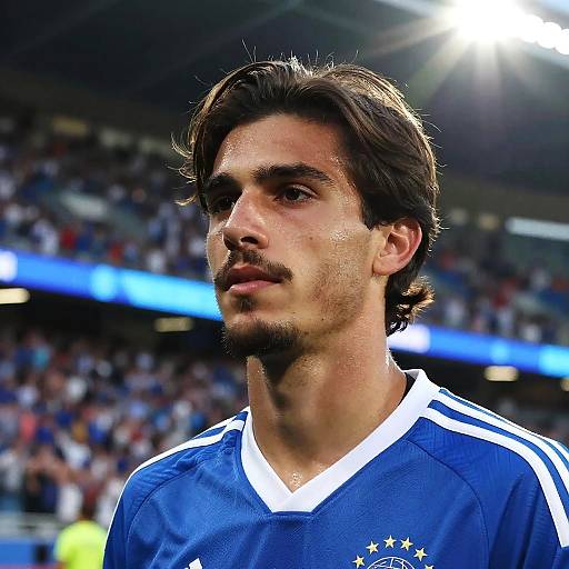 Thoughtful Young Man in Stadium