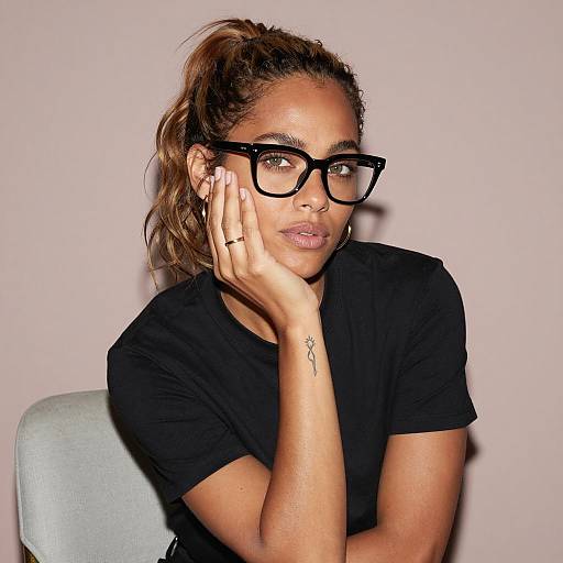 Thoughtful Woman Wearing Glasses