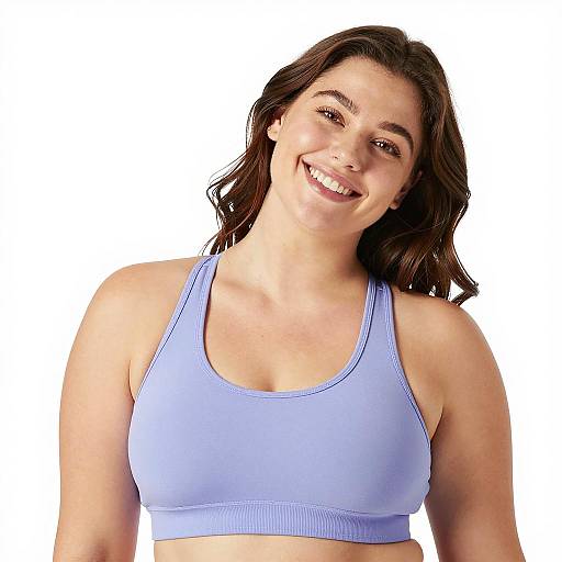 Smiling woman in purple sports bra