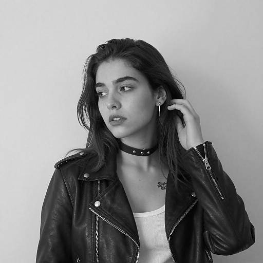 Black-and-White Portrait of Woman in Leather Jacket