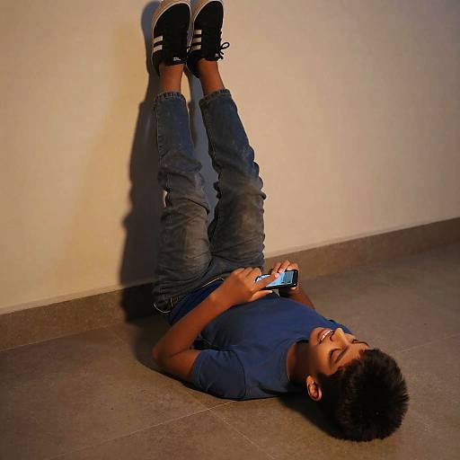 Young Indian Boy Chatting at Dusk