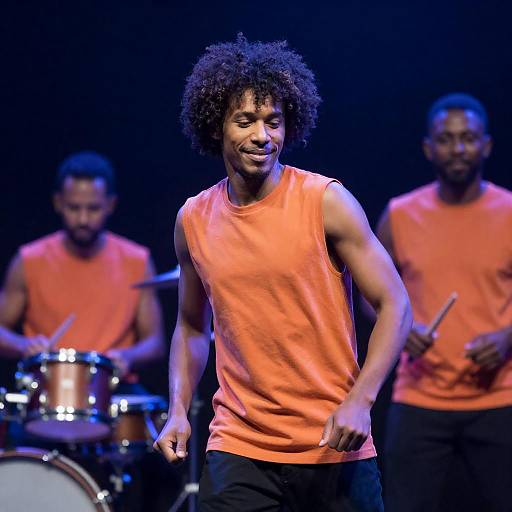 Energetic Dance Performance Under Dim Lights