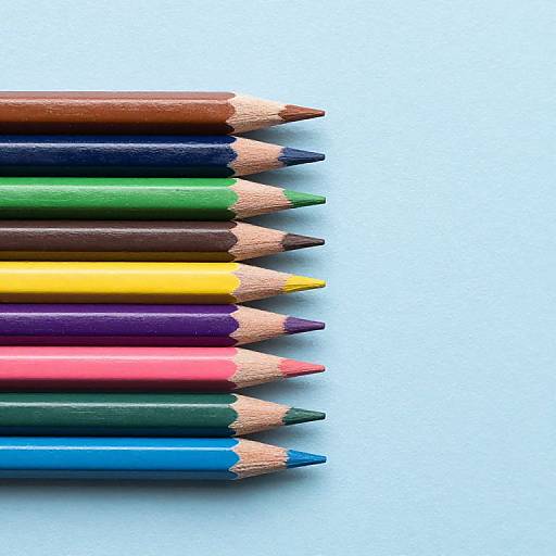 Photograph of twelve colored pencils, stacked vertically, showing sharpened tips, with vibrant colors including brown, blue, green, yellow, purple, pink