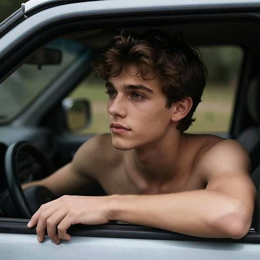 Young Man in Car: Candid Photography