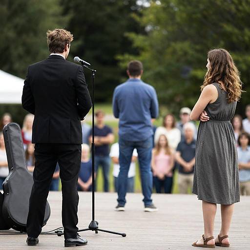 Outdoor Performance with Guitarist and Audience