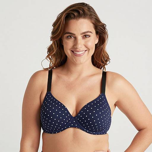 Smiling Woman in Dark Blue Polka Dot Bra
