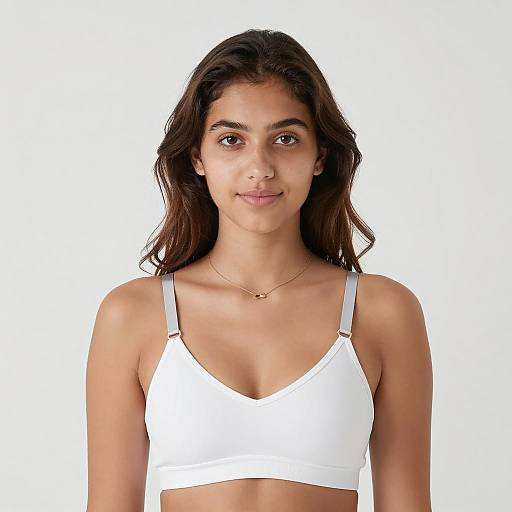 Young Woman Wearing White Bra with Gray Straps