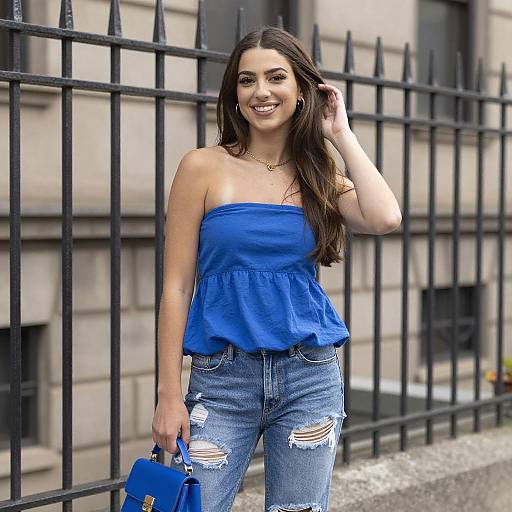 Smiling Woman in Blue Outfit