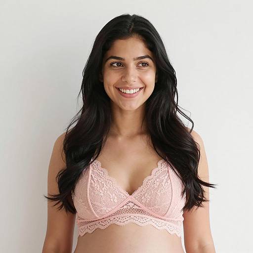 Smiling Pregnant Woman in Soft Lighting