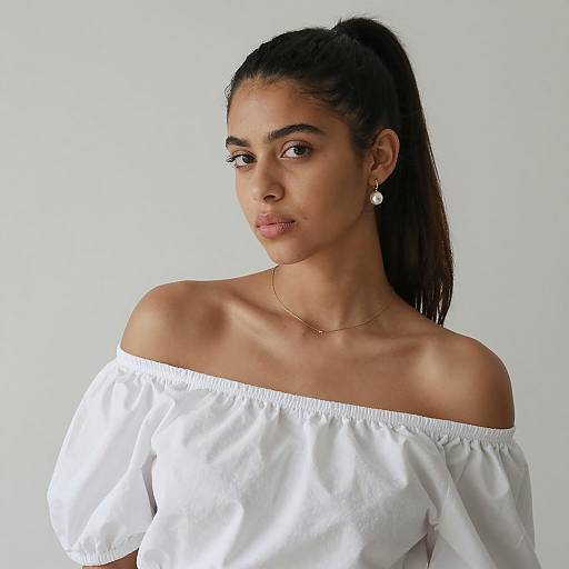 Young Woman in Off-Shoulder White Blouse