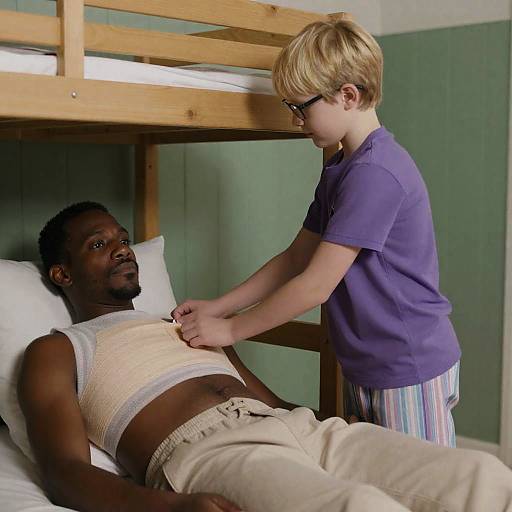 Boy Caring for Injured Man in Bedroom