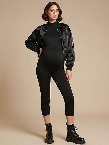 Sleek Monochrome Maternity Fashion Portrait