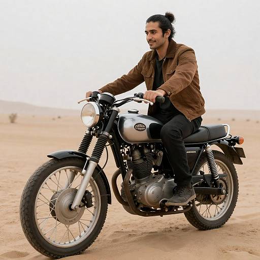 Man Riding Vintage Motorcycle in Desert
