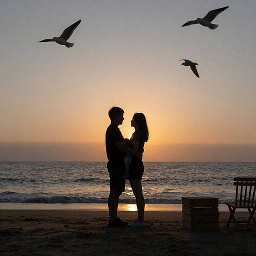Couple with Child at Sunset Beach
