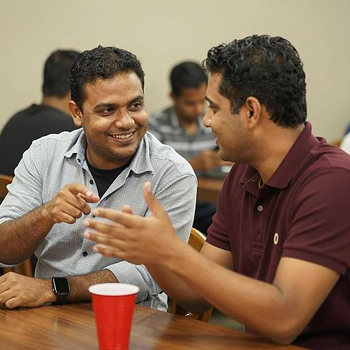 Casual Indoor Conversation Between Friends