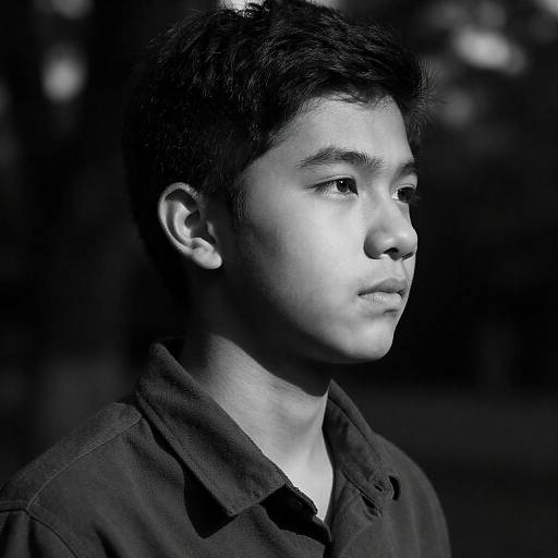 High-Contrast Black-and-White Male Portrait Looking Right