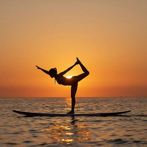 Yoga on Surfboard at Sunset