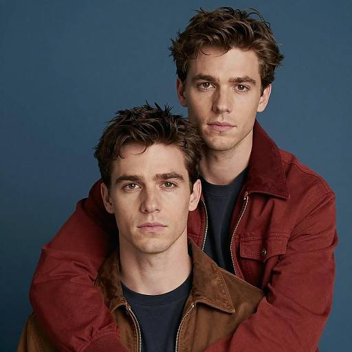 Portrait of Two Men Embracing