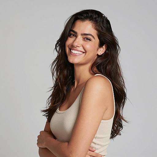 Smiling Woman in Beige Tank Top