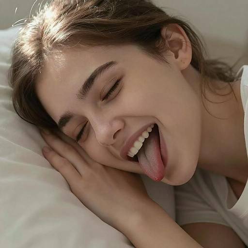 Young Woman Playfully Sticking Out Tongue