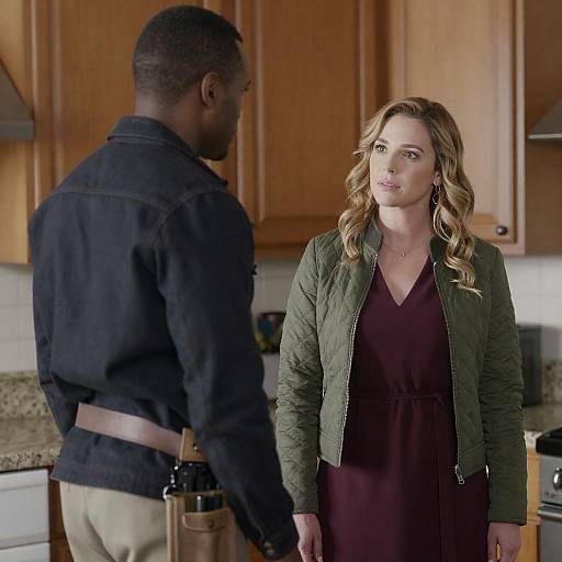 Kitchen Scene: Man and Woman Conversing