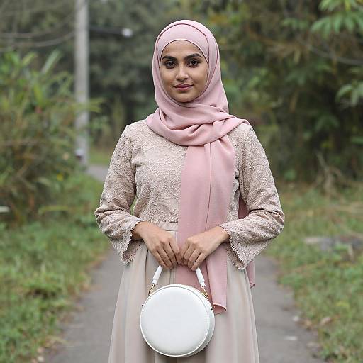 Young Woman in Pink Hijab in Forest