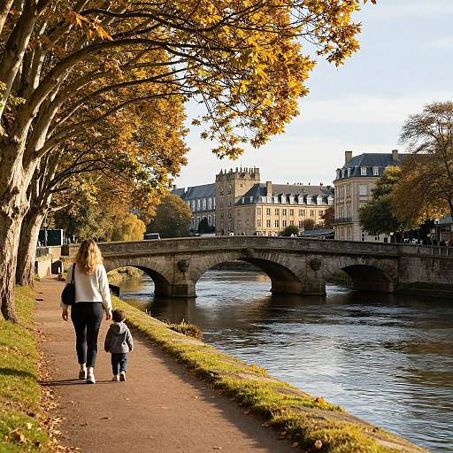 Autumn Riverside Walk with Stone Bridge