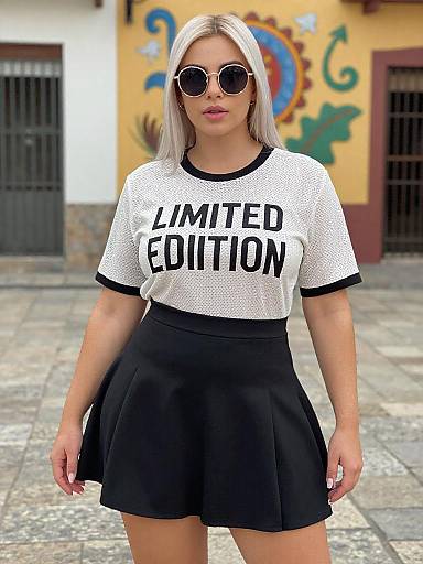 Curvy Chic Woman in Vibrant Plaza