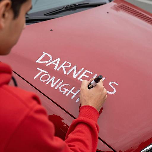 Chalk Art on a Red Car Hood