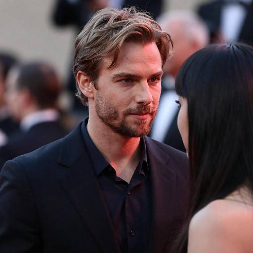 Red-Lit Intense Portrait of Two Figures