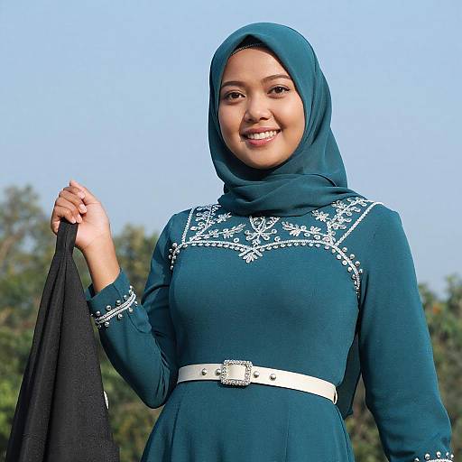 Confident Asian Woman in Teal Hijab