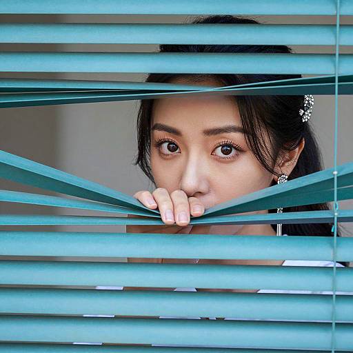 Intriguing Woman Behind Teal Blinds