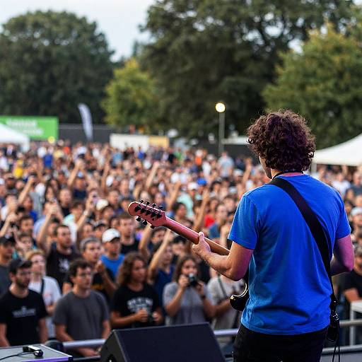 Energetic Male Musician in Outdoor Concert