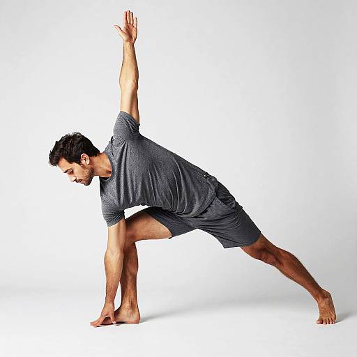 Man Yoga Pose in Casual Wear