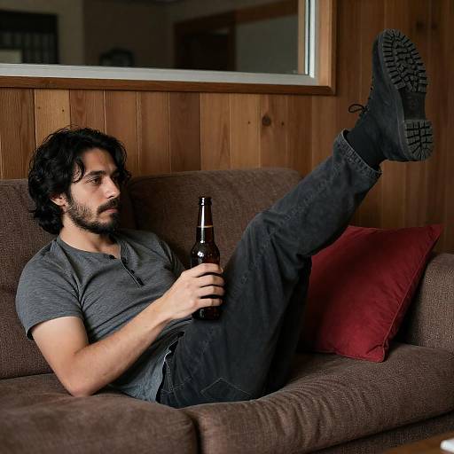 Relaxed Man on Couch with Beer