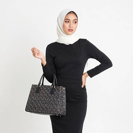 Young Asian Woman in Hijab and Black Dress