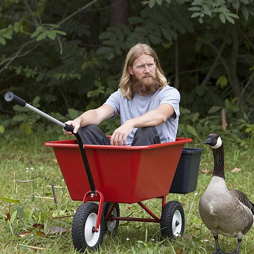 Man in DIY Irrigation Cart on Grass