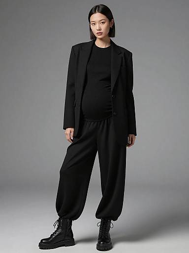 Sleek Monochrome Maternity Fashion Portrait