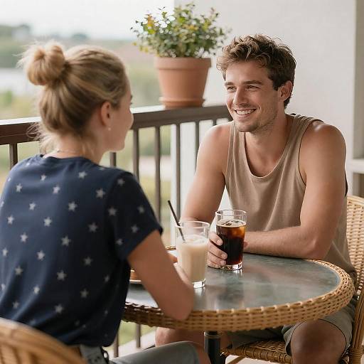 Couple at Wicker Balcony Table