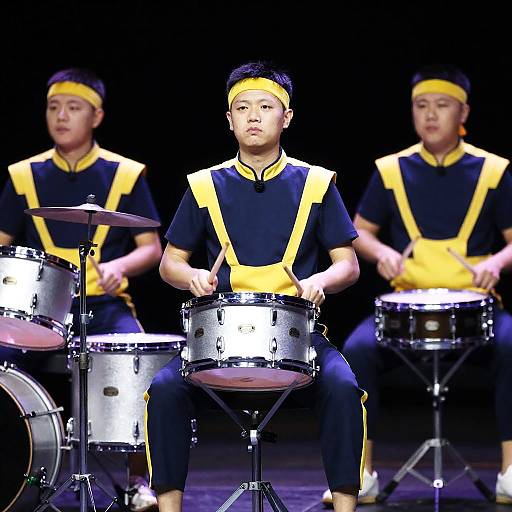 Dynamic Drummers Performing on Stage