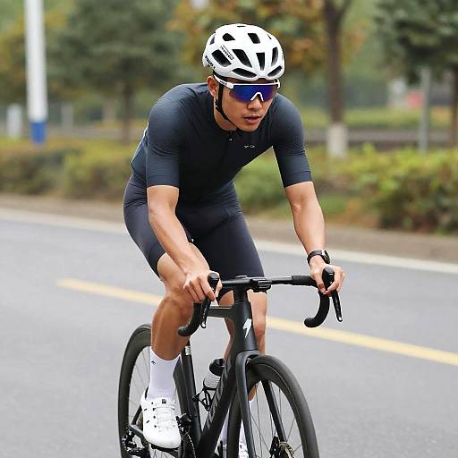 Man Riding Bike in Cycling Outfit